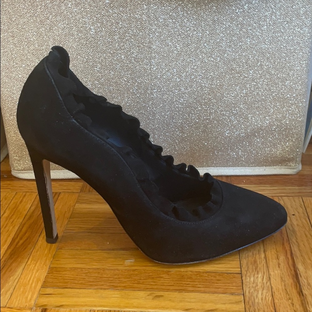 A pair of super cute black Giuseppe Zandotti heels